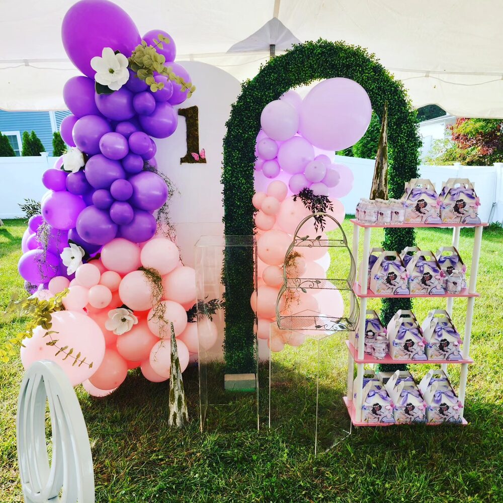 Purple and pink boxwood arch, garden first birthday party