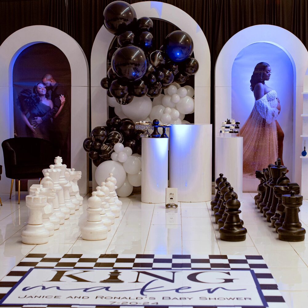 Black and white chess-themed baby shower with King Maker signage