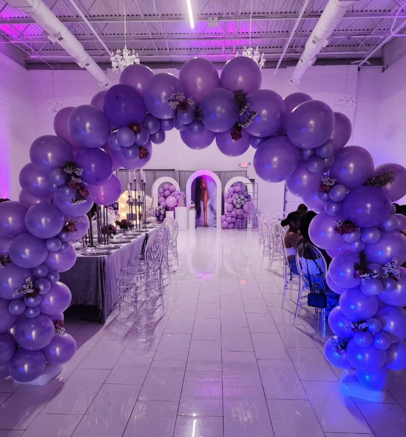 Purple and lavender balloon arch, quinceañera reception hall